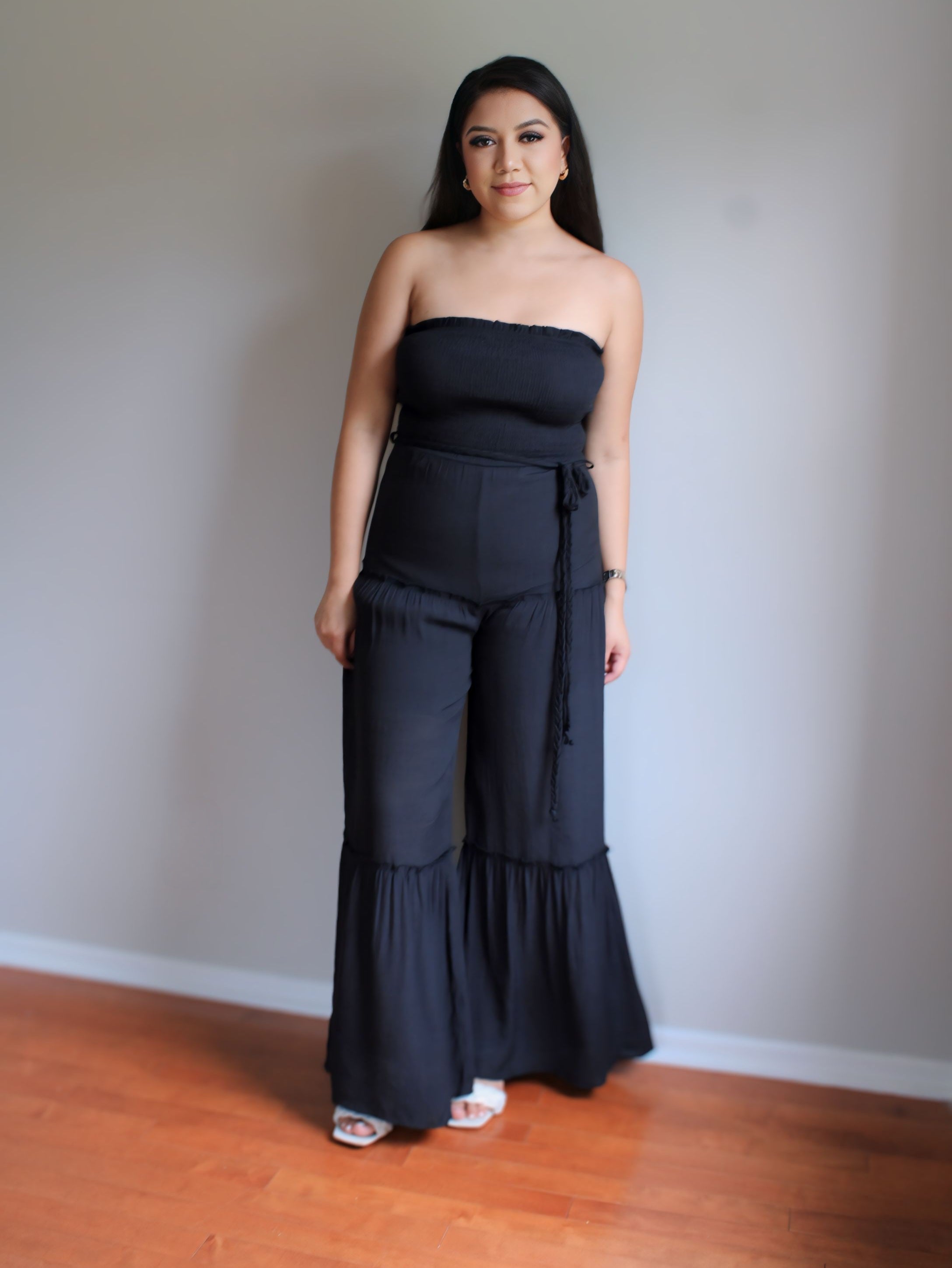 Perfect Woven Sleeveless Smocked Ruffle Jumpsuit in Black